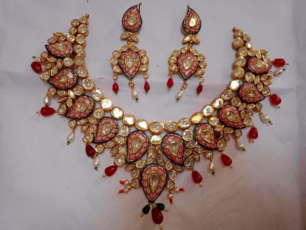 Bridal rajputi haar with tika and aad